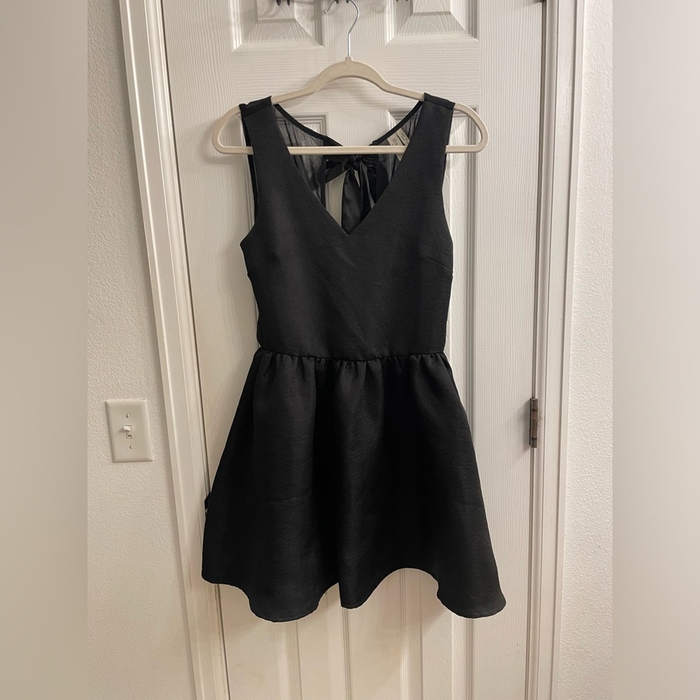 Black dress, size small. Mesh back with bow.